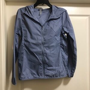 Ladies Small blue nylon zip jacket with back zip pocket and hood